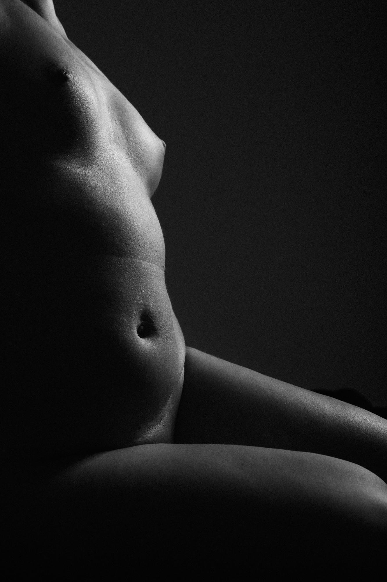 Black and white artistic nude photograph of a female body at Studio Pezinok.